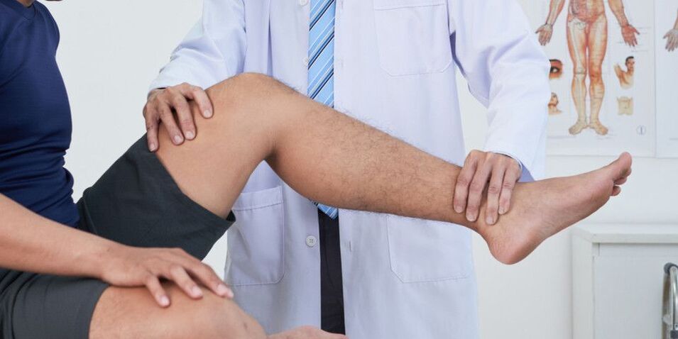 knee examination by doctor